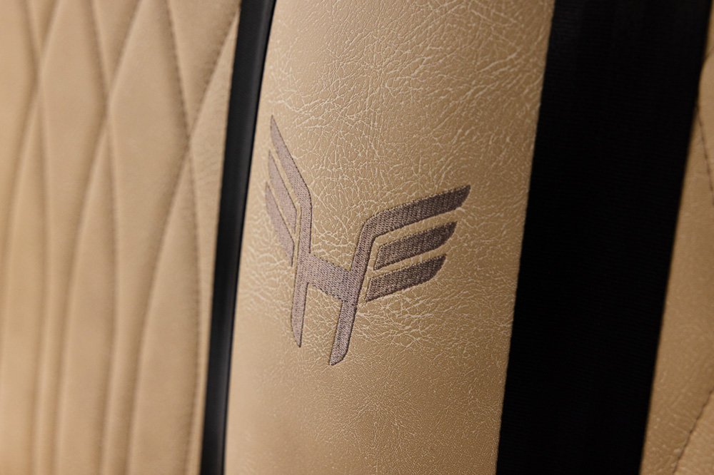 Honor embroidery and stitching in tan Boulevard seat upholstery